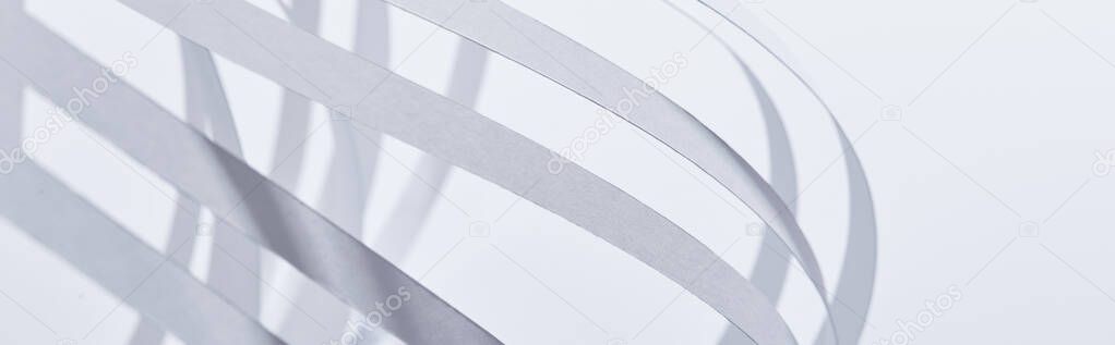 close up view of paper stripes isolated on white, panoramic shot