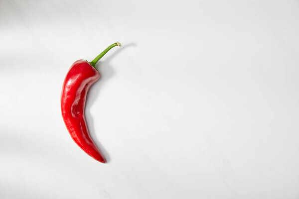 Top view of chili pepper on white background