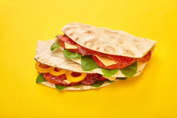 Fresh Sandwiches Salami Pita Vegetables Cheese Yellow Background — Stock Photo, Image