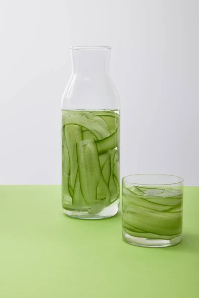 Bottle Glass Drink Made Sliced Cucumbers Isolated Grey — Stock Photo, Image