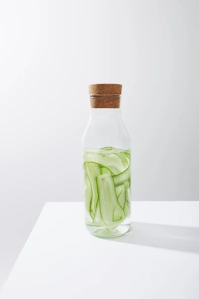 Glass Bottle Cork Drink Made Sliced Cucumbers Isolated Grey — Stock Photo, Image