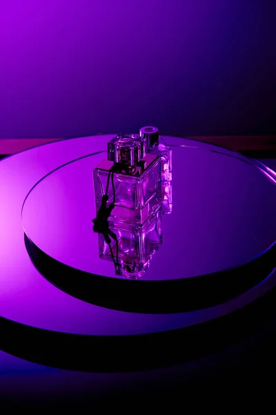 Violet Perfume Bottles Mirror Surface Isolated Purple — Stock Photo, Image