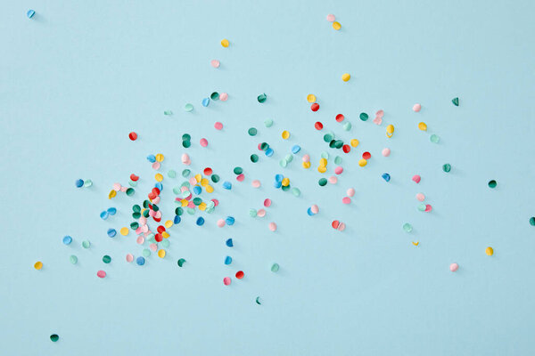 Top View Colorful Confetti Scattered Blue Background — Stock Photo, Image
