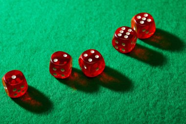 High angle view of dice on green background clipart