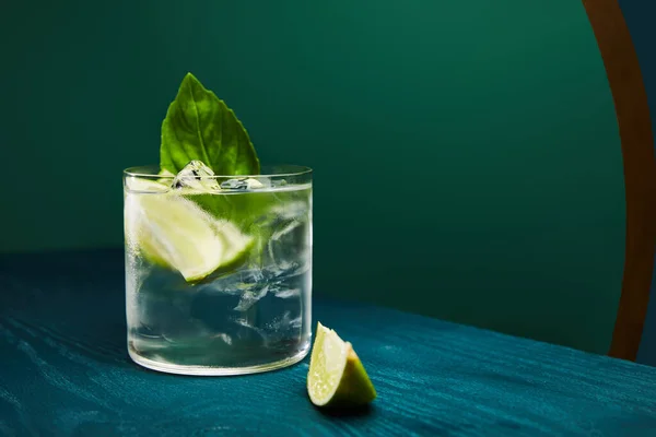 Close View Old Fashioned Glass Drink Lime Blue Wooden Surface — Stock Photo, Image