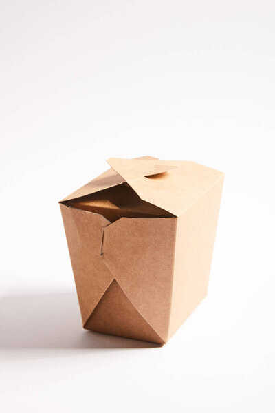 cardboard takeaway box with chinese food on white