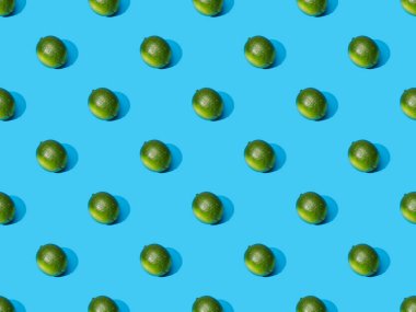 Taze limonlar mavi arka planda, pürüzsüz desen