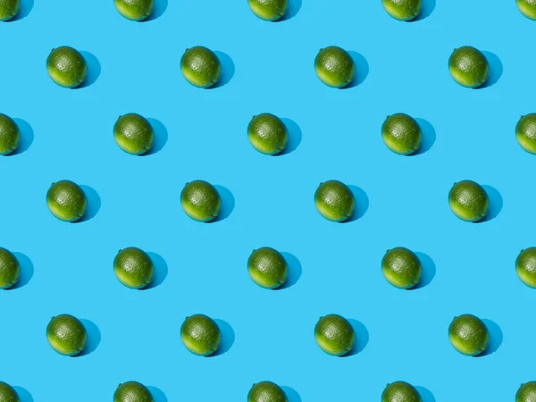 Fresh Whole Limes Blue Colorful Background Seamless Pattern — Stock Photo, Image