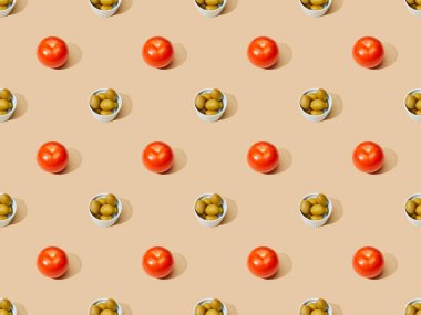 olives in bowls with tomatoes on beige background, seamless pattern clipart