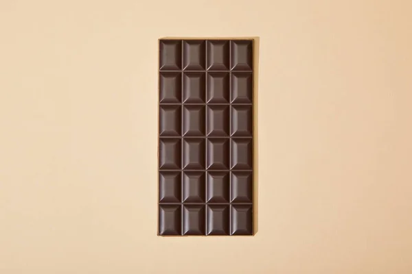 Top View Sweet Dark Chocolate Bar Beige Background — Stock Photo, Image