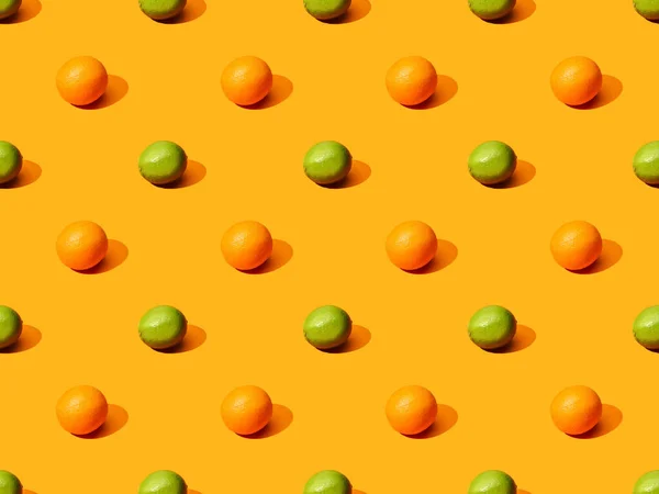 Naranjas Maduras Limas Sobre Fondo Colorido Patrón Sin Costuras — Foto de Stock