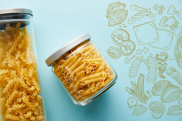 Top View Raw Penne Fusilli Jars Blue Background Food Illustration — Stock Photo, Image