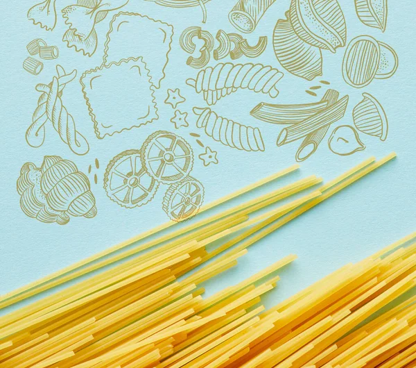 Bovenaanzicht Van Rauwe Spaghetti Blauwe Achtergrond Met Voedselillustratie — Stockfoto