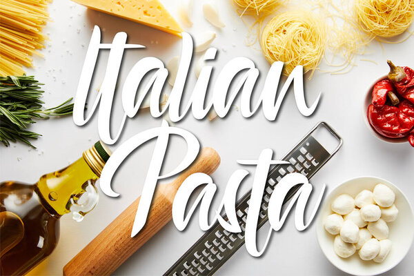 Top view of rolling pin, bottle of olive oil, grater, pasta and ingredients on white, italian pasta illustration
