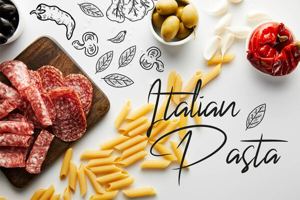 Top view of pasta, sea salt, garlic, meat platter and bowls with olives and marinated chili peppers on white background, italian pasta illustration