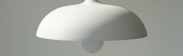 panoramic crop of white and modern lamp with light bulb