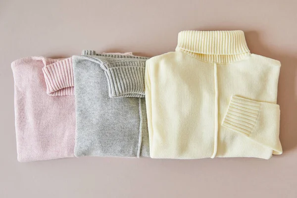 Top View Pink Beige Grey Knitted Soft Sweaters — Stock Photo, Image