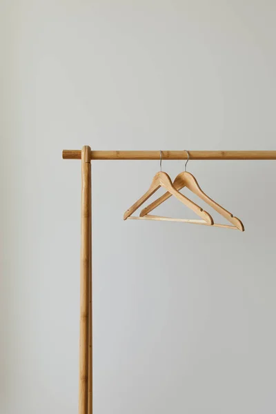 Close View Empty Hangers Wooden Rack Isolated White — Stock Photo, Image