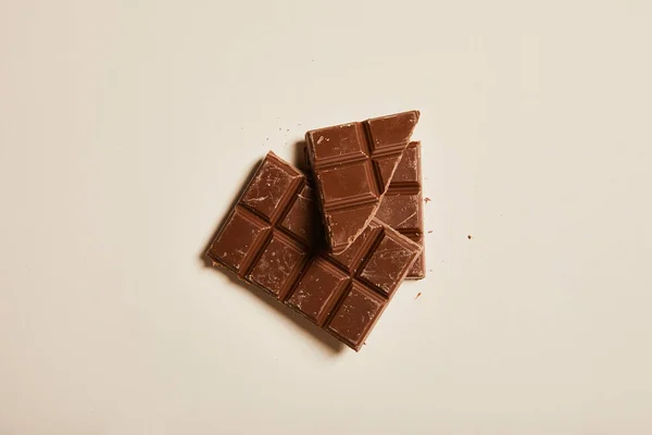 Vista Superior Chocolate Con Leche Dulce Sobre Fondo Beige — Foto de Stock