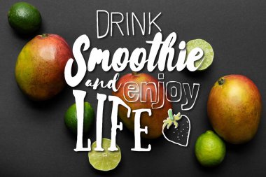 top view of ripe limes and mango on black background, drink smoothie and enjoy life illustration clipart