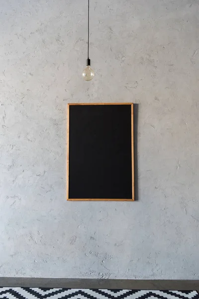 Blackboard in wooden frame — Stock Photo