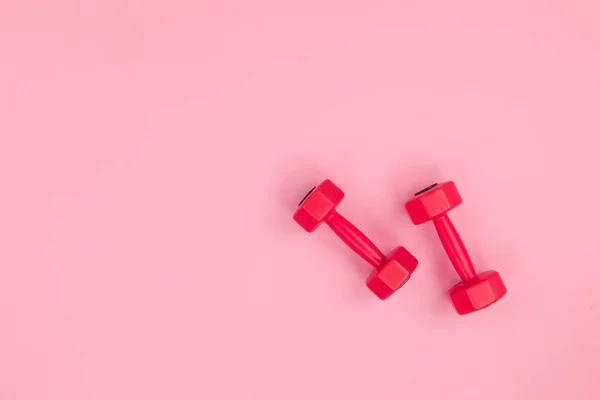 Red dumbbells for fitness — Stock Photo