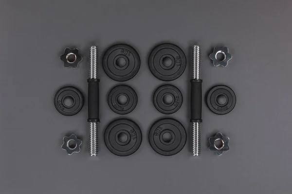 Metal barbells and weights — Stock Photo