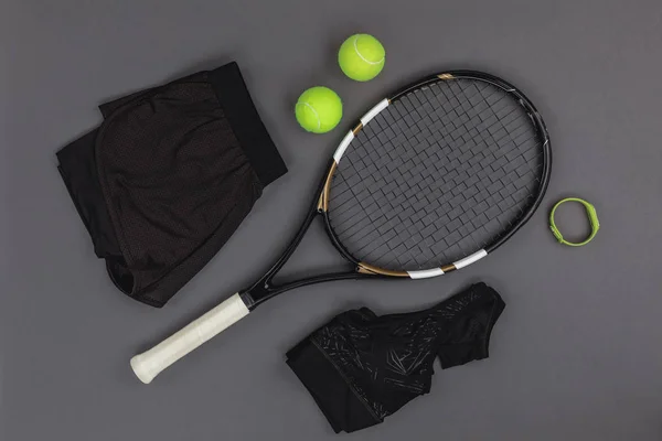 Tennis equipment and sportswear — Stock Photo