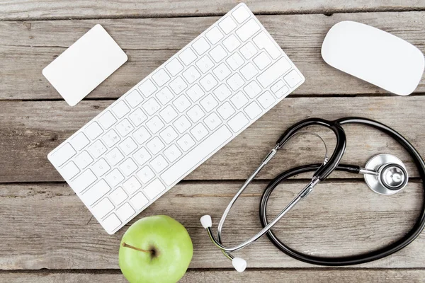 Digital devices and fresh apple — Stock Photo