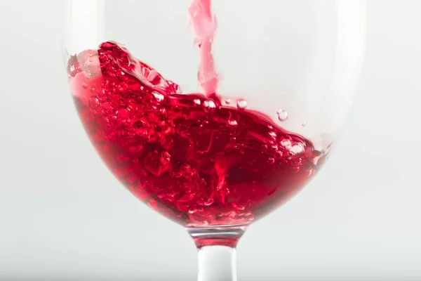 Wine pouring in glass — Stock Photo