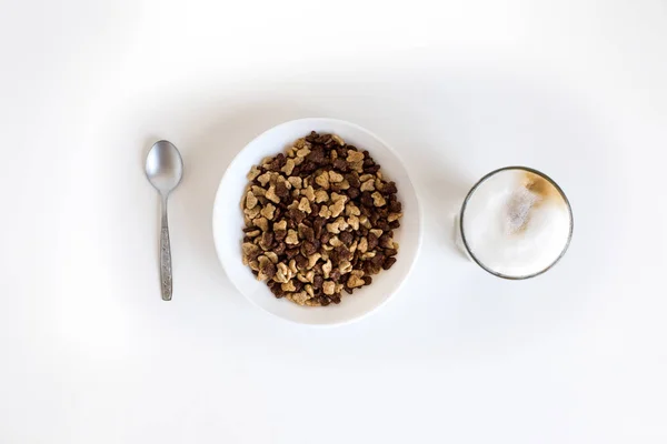 Glass of coffee and cornflakes — Stock Photo