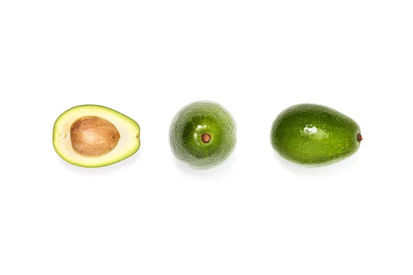 Compotsition of fresh avocados — Stock Photo