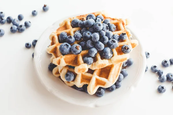 Tasty waffles with blueberries — Stock Photo