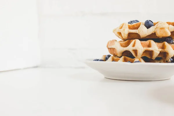 Tasty waffles with blueberries — Stock Photo