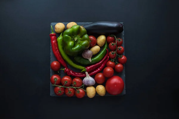Ripe vegetables and slate board — Stock Photo