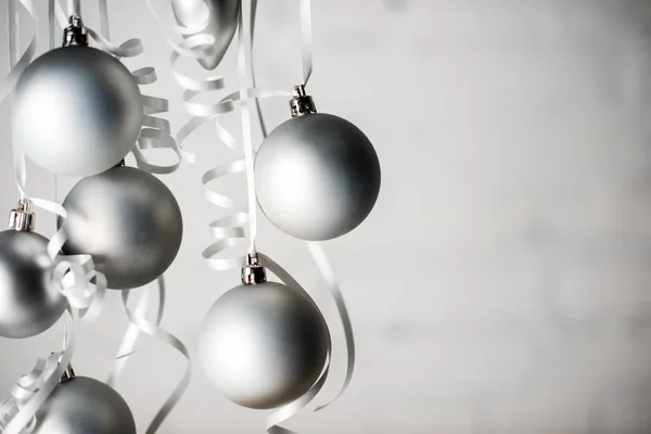 Christmas balls on ribbons — Stock Photo