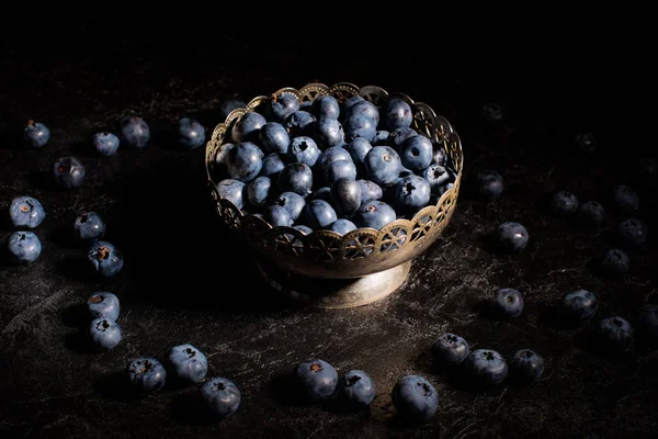 Blueberries in vintage bowl — Stock Photo