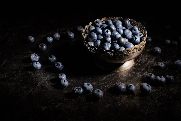 Blueberries in vintage bowl — Stock Photo