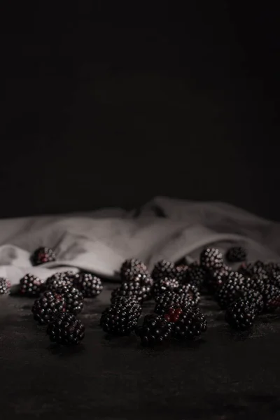 Blackberries and fabric — Stock Photo