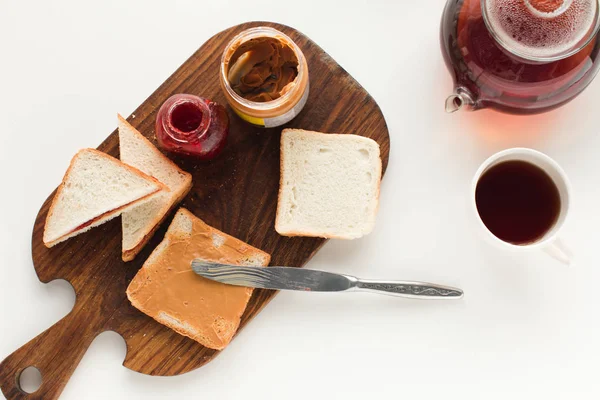 Toasts with jam and peanut butter — Stock Photo