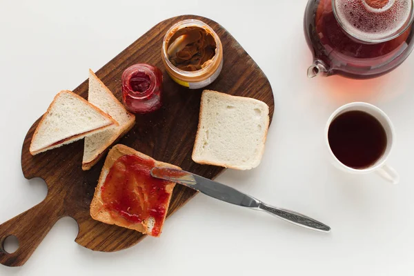 Toasts with jam and peanut butter — Stock Photo