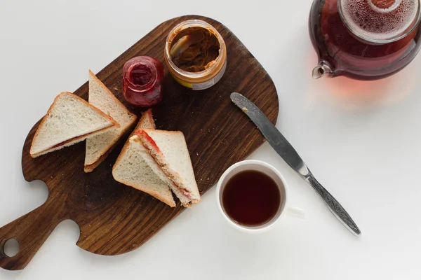 Toasts with jam and peanut butter — Stock Photo