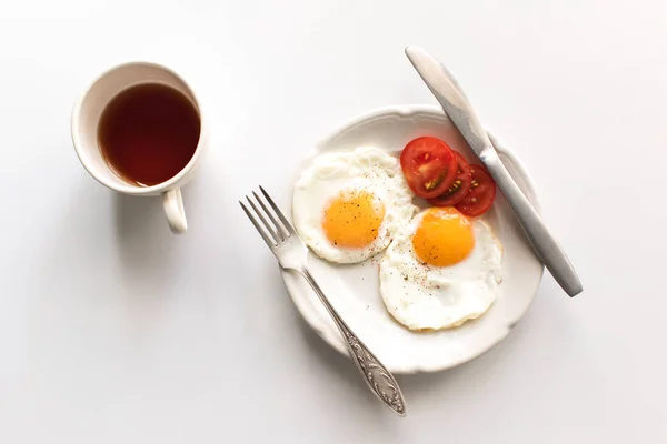 Breakfast with fried eggs — Stock Photo