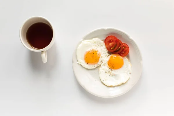 Breakfast with fried eggs — Stock Photo