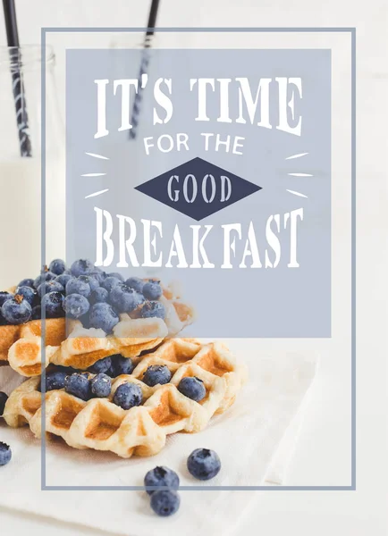 Waffles with blueberries and milk — Stock Photo