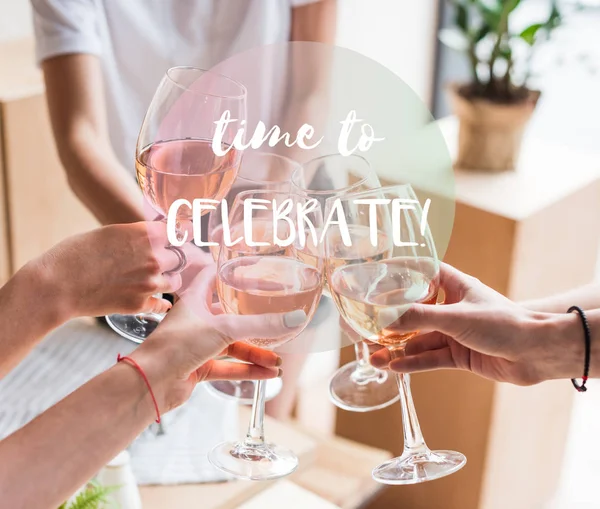 Women clinking with wineglasses — Stock Photo
