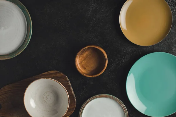 Plates and cutting board — Stock Photo