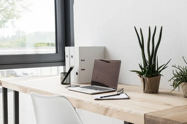 Workplace with laptop computer — Stock Photo