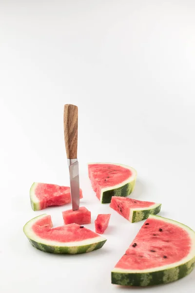 Watermelon slices with knife — Stock Photo