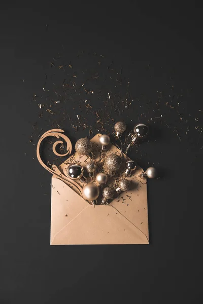 Christmas balls in envelope — Stock Photo